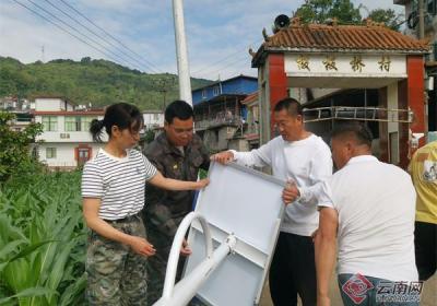 云南金平：村企携手共建 “电”亮村民出行路