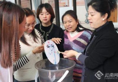 昆明陈家社区举办“传承之美，非遗漆扇”制作活动